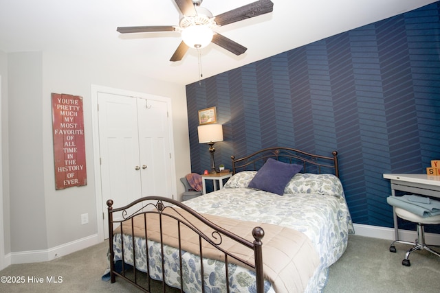 305 3rd St, Aberdeen, NC 28315 - carpeted bedroom featuring baseboards, wallpapered walls, a ceiling fan, and a closet
