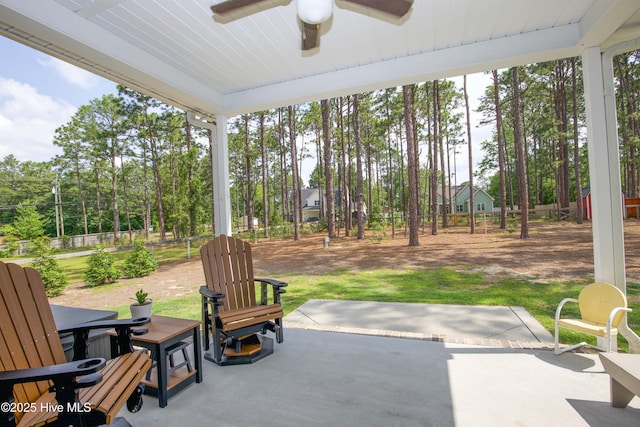 305 3rd St, Aberdeen, NC 28315 - fenced backyard featuring a ceiling fan, a patio area, and outdoor dining area