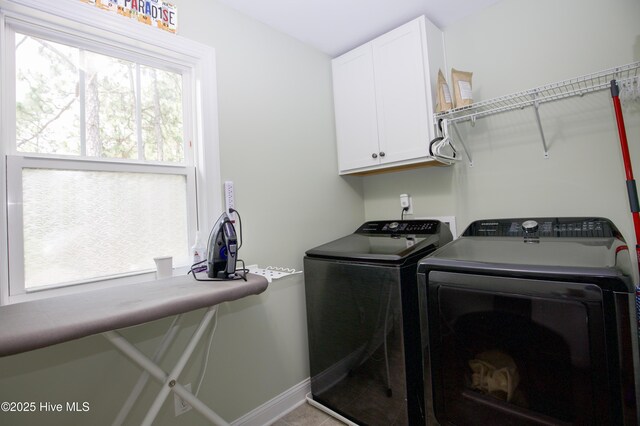 305 3rd St, Aberdeen, NC 28315 - laundry area with washer and clothes dryer, cabinet space, and baseboards