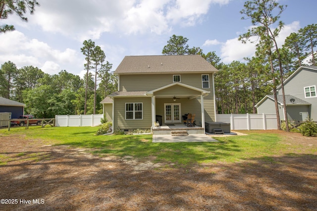 305 3rd St, Aberdeen, NC 28315 - back of property featuring a patio, french doors, a hot tub, a ceiling fan, and crawl space