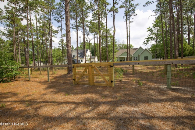 305 3rd St, Aberdeen, NC 28315 - view of yard with a gate