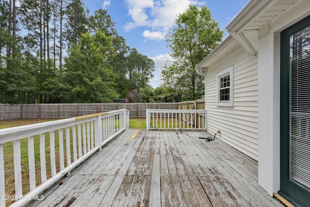 1415 Setter Ct, Wilmington, NC 28411 - wooden terrace featuring view of wooded area