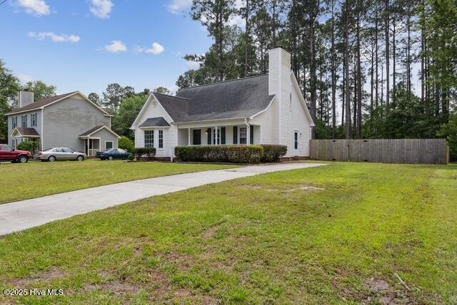 1415 Setter Ct, Wilmington, NC 28411 - view of front of house with a chimney
