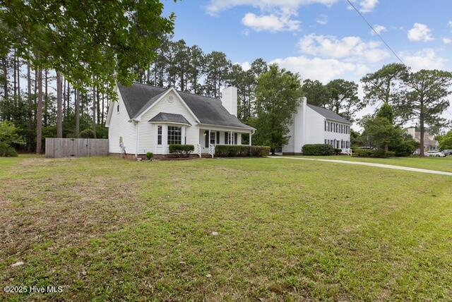 1415 Setter Ct, Wilmington, NC 28411 - view of front of house featuring a chimney
