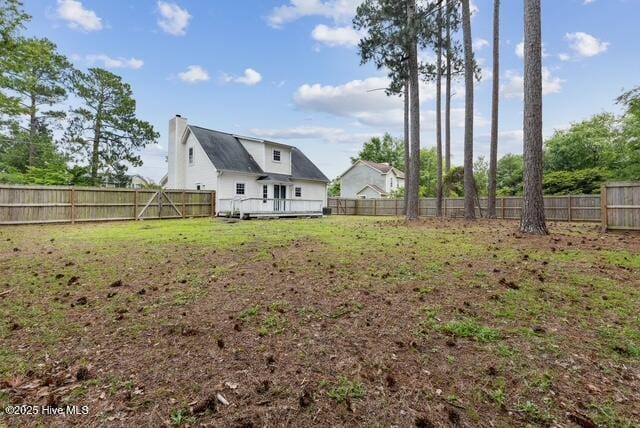 1415 Setter Ct, Wilmington, NC 28411 - rear view of house featuring a deck and a chimney