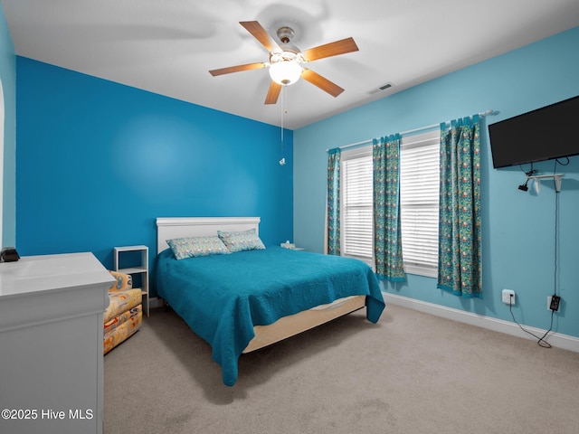 211 Brook Crossing Rd, Swansboro, NC 28584 - carpeted bedroom featuring baseboards and a ceiling fan