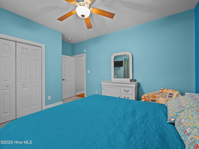 211 Brook Crossing Rd, Swansboro, NC 28584 - bedroom featuring a closet and a ceiling fan