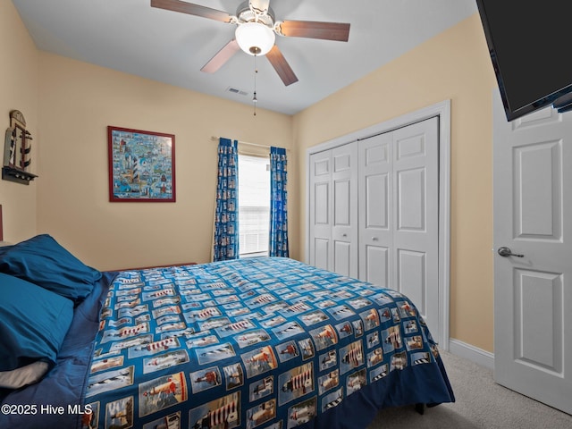 211 Brook Crossing Rd, Swansboro, NC 28584 - bedroom featuring carpet floors, a closet, and a ceiling fan