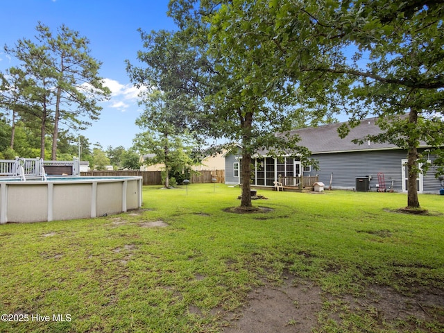 211 Brook Crossing Rd, Swansboro, NC 28584 - view of yard with an outdoor pool
