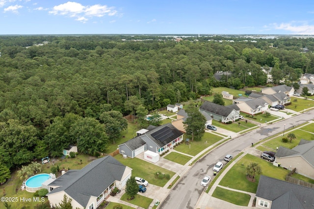 211 Brook Crossing Rd, Swansboro, NC 28584 - aerial perspective of suburban area featuring a heavily wooded area