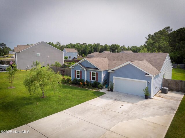 227 Cheswick Dr, Holly Ridge, NC 28445 - single story home featuring concrete driveway, an attached garage, and a shingled roof