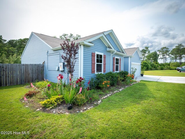 227 Cheswick Dr, Holly Ridge, NC 28445 - view of side of property with concrete driveway
