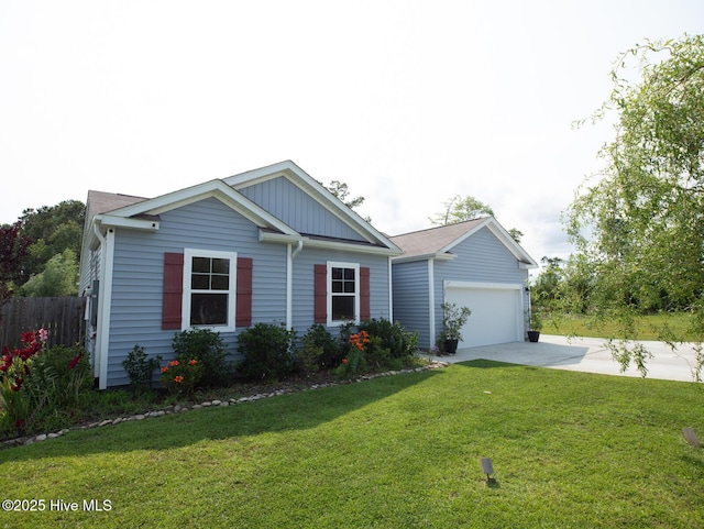227 Cheswick Dr, Holly Ridge, NC 28445 - ranch-style house featuring concrete driveway, a garage, and board and batten siding