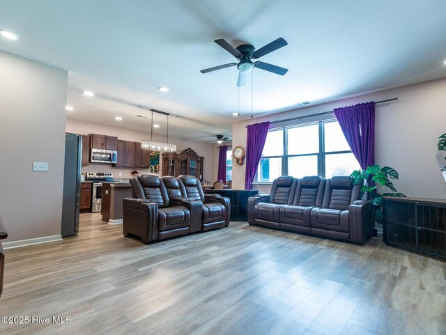 227 Cheswick Dr, Holly Ridge, NC 28445 - living area featuring a ceiling fan, light wood-type flooring, recessed lighting, and baseboards