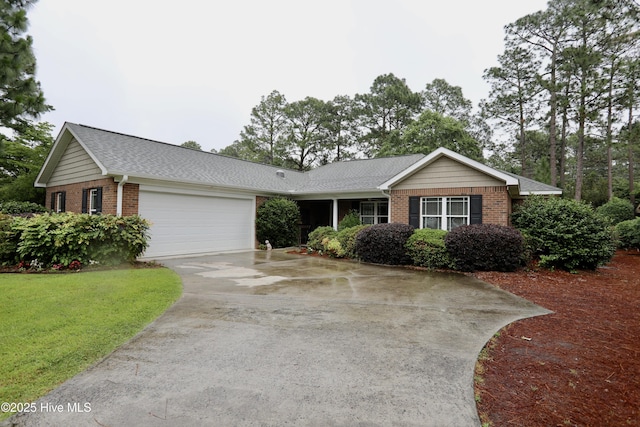 275 Pinehurst Trace Dr, Pinehurst, NC 28374 - ranch-style house featuring brick siding, an attached garage, driveway, and a shingled roof