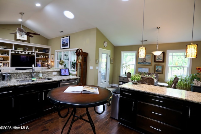275 Pinehurst Trace Dr, Pinehurst, NC 28374 - kitchen featuring a sink, lofted ceiling, dark wood-type flooring, dark cabinets, and a ceiling fan