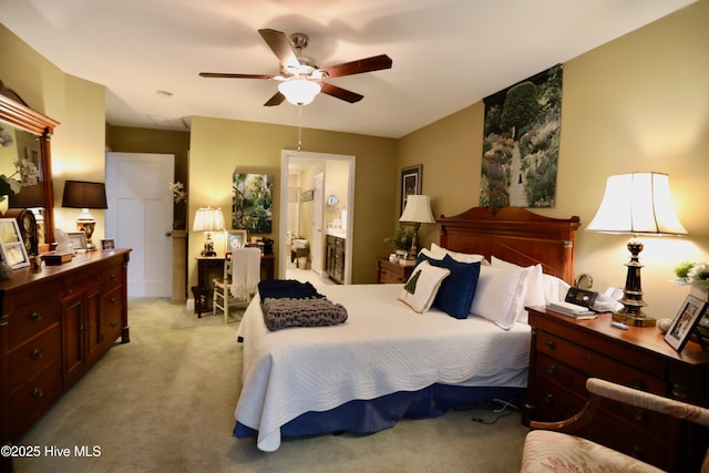 275 Pinehurst Trace Dr, Pinehurst, NC 28374 - bedroom featuring light colored carpet, ceiling fan, and ensuite bathroom