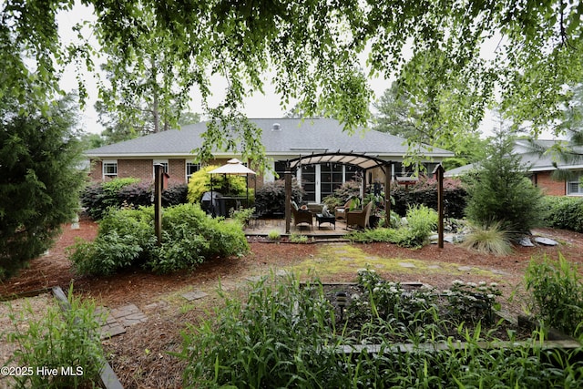 275 Pinehurst Trace Dr, Pinehurst, NC 28374 - rear view of property featuring a patio area, a pergola, and a shingled roof