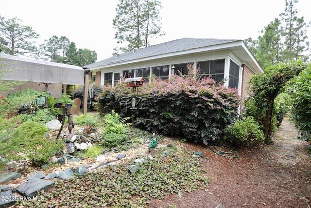 275 Pinehurst Trace Dr, Pinehurst, NC 28374 - back of house with a sunroom