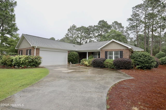 275 Pinehurst Trace Dr, Pinehurst, NC 28374 - single story home featuring brick siding, driveway, a garage, and a front yard