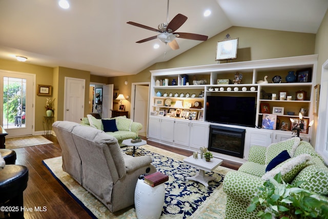 275 Pinehurst Trace Dr, Pinehurst, NC 28374 - living room featuring vaulted ceiling, dark wood-style flooring, ceiling fan, recessed lighting, and a glass covered fireplace