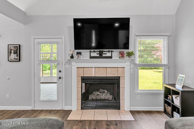 105 Sea Turtle Cv, Sneads Ferry, NC 28460 - living area with wood finished floors, baseboards, and a fireplace