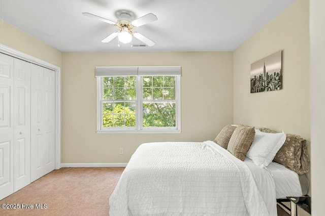 105 Sea Turtle Cv, Sneads Ferry, NC 28460 - bedroom with carpet, baseboards, a closet, and a ceiling fan