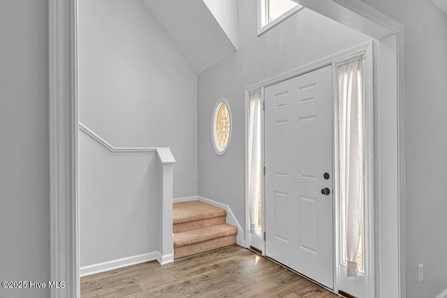 105 Sea Turtle Cv, Sneads Ferry, NC 28460 - foyer with wood finished floors, baseboards, stairway, and a high ceiling