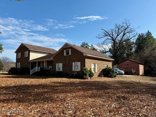 1164 Ocean Hwy N, Hertford, NC 27944 - view of side of home featuring brick siding
