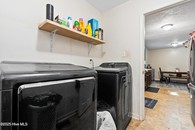 330 Brookfield Dr, Wilmington, NC 28405 - washroom featuring washer and dryer and a textured ceiling