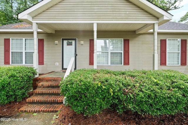 330 Brookfield Dr, Wilmington, NC 28405 - property entrance featuring covered porch and a shingled roof