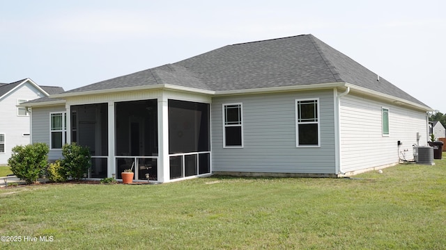 134 Longhorn Rd, Jacksonville, NC 28546 - rear view of property with a lawn, a sunroom, and roof with shingles