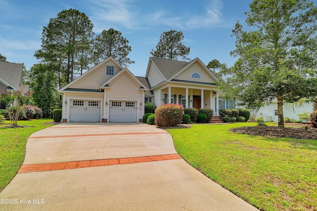 1711 Heather Run Ct SE, Bolivia, NC 28422 - view of front of house with driveway, a front yard, a porch, and a garage