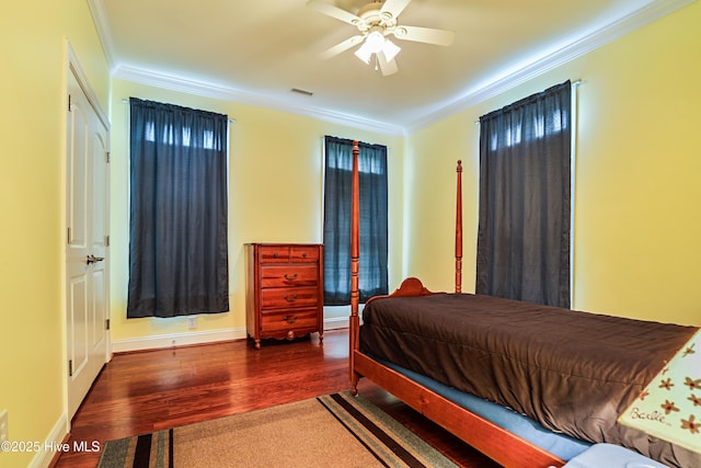 1711 Heather Run Ct SE, Bolivia, NC 28422 - bedroom featuring crown molding, wood finished floors, baseboards, and a ceiling fan