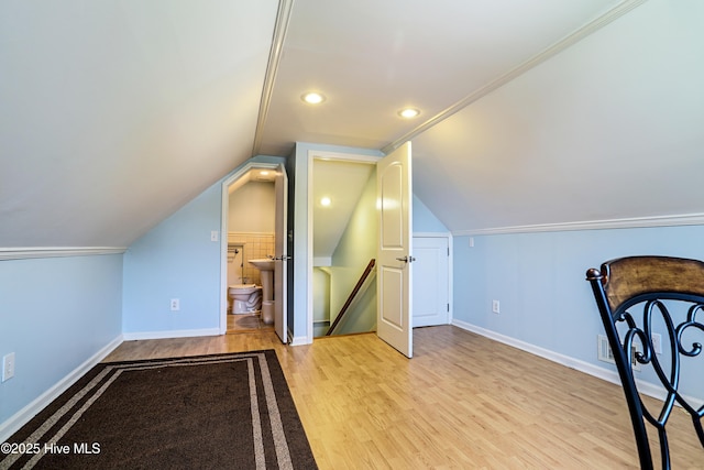 1711 Heather Run Ct SE, Bolivia, NC 28422 - additional living space featuring wood finished floors, baseboards, lofted ceiling, and recessed lighting