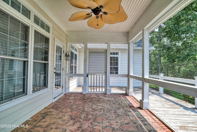 1711 Heather Run Ct SE, Bolivia, NC 28422 - unfurnished sunroom with a ceiling fan