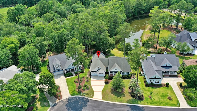 1711 Heather Run Ct SE, Bolivia, NC 28422 - aerial view of residential area featuring a nearby body of water and a forest