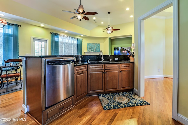 1711 Heather Run Ct SE, Bolivia, NC 28422 - kitchen with dishwasher, a sink, ceiling fan, recessed lighting, and light wood-type flooring