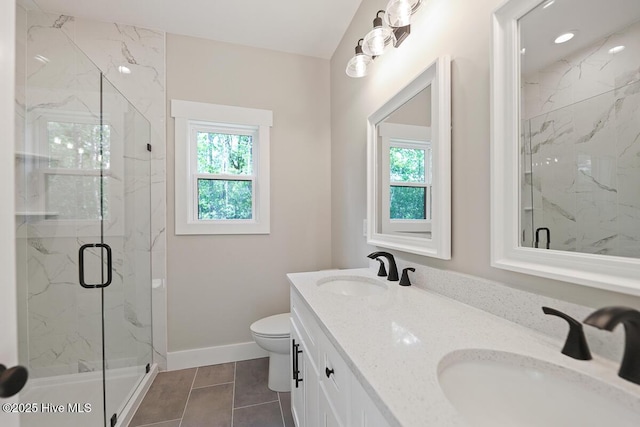 189 Craven Ct, Calabash, NC 28467 - bathroom featuring plenty of natural light, a marble finish shower, toilet, and baseboards