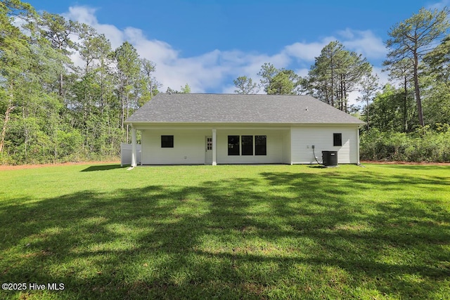 189 Craven Ct, Calabash, NC 28467 - back of house with a yard and central AC