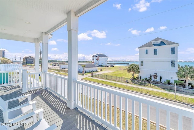 209 S 11th St, Morehead City, NC 28557 - covered porch featuring a water view