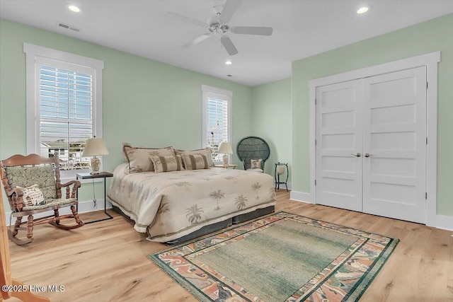 209 S 11th St, Morehead City, NC 28557 - bedroom featuring wood finished floors, recessed lighting, baseboards, ceiling fan, and a closet