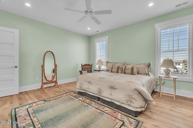 209 S 11th St, Morehead City, NC 28557 - bedroom with light wood-style floors, baseboards, recessed lighting, and a ceiling fan