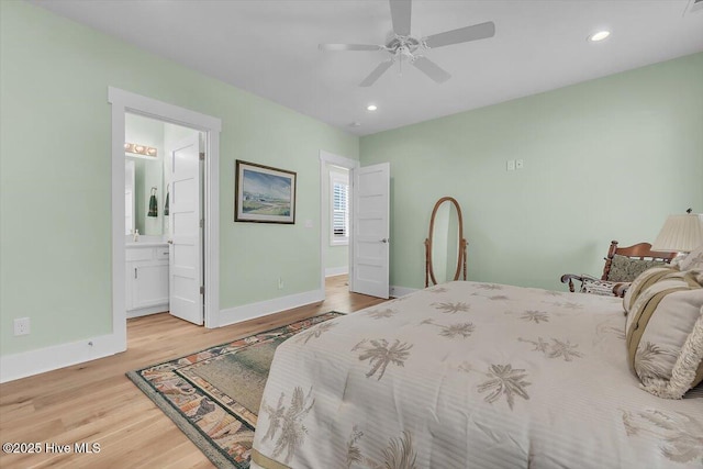 209 S 11th St, Morehead City, NC 28557 - bedroom featuring baseboards, wood finished floors, recessed lighting, ensuite bath, and ceiling fan
