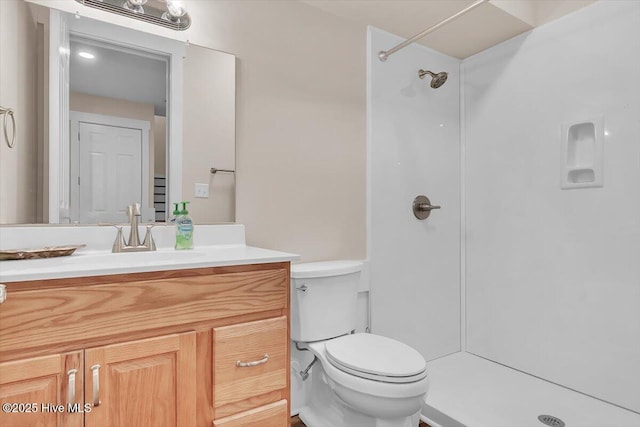 209 S 11th St, Morehead City, NC 28557 - bathroom featuring vanity, toilet, and a shower