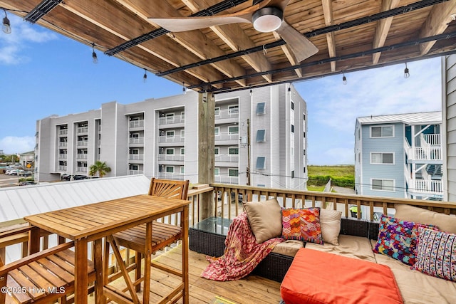 208 Carolina Beach Ave S Unit 202, Carolina Beach, NC 28428 - deck with outdoor lounge area and a ceiling fan