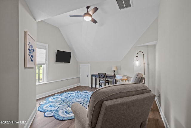 110 Gemini Dr, Cape Carteret, NC 28584 - living area featuring wood finished floors, vaulted ceiling, and a ceiling fan