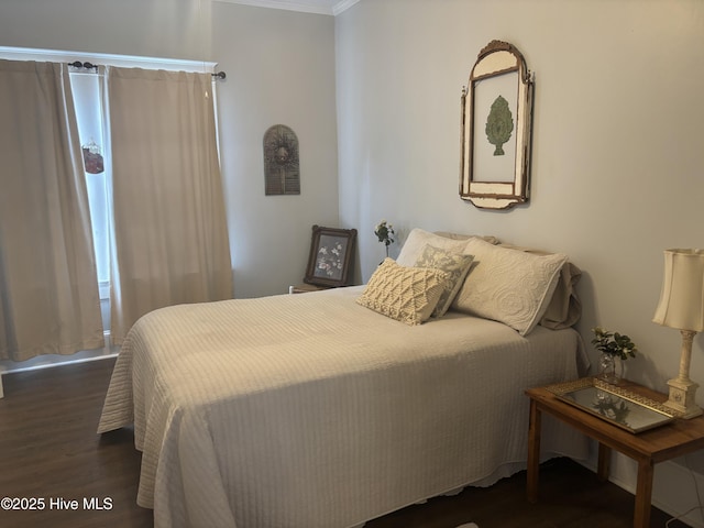 314 Ave B, New Bern, NC 28560 - bedroom featuring dark wood-style flooring and crown molding