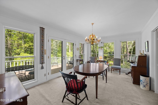 103 Camelia Dr, Washington, NC 27889 - dining room featuring crown molding, light carpet, a chandelier, and french doors
