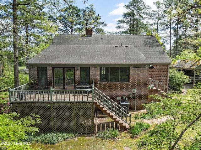103 Camelia Dr, Washington, NC 27889 - back of house with stairs, a chimney, brick siding, and a wooden deck